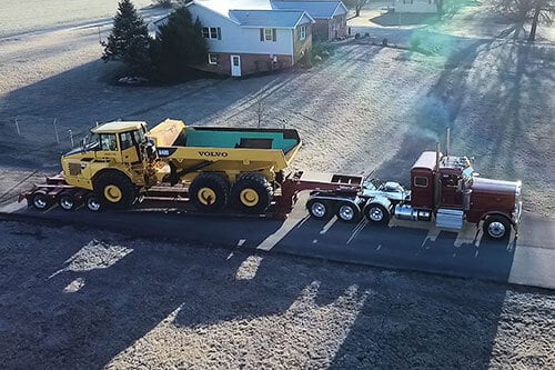 Truck Hauling Rock Trucks