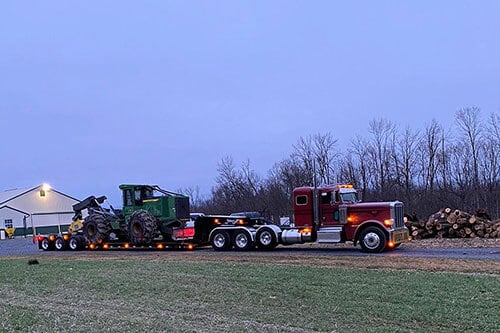 Truck Hauling Tractor