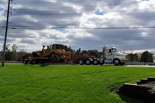 Truck Hauling Dozer