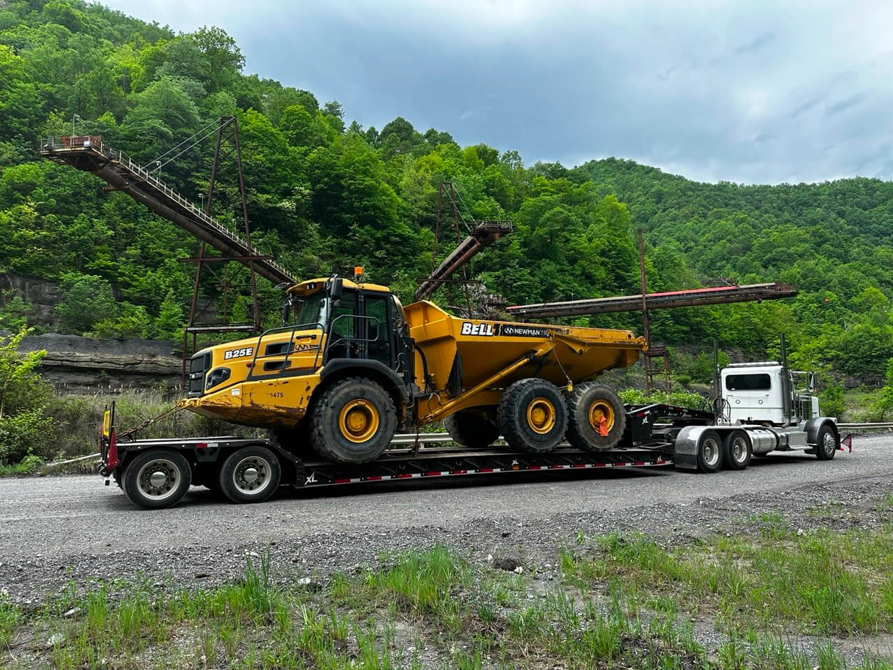 Truck Hauling CAT Equipment