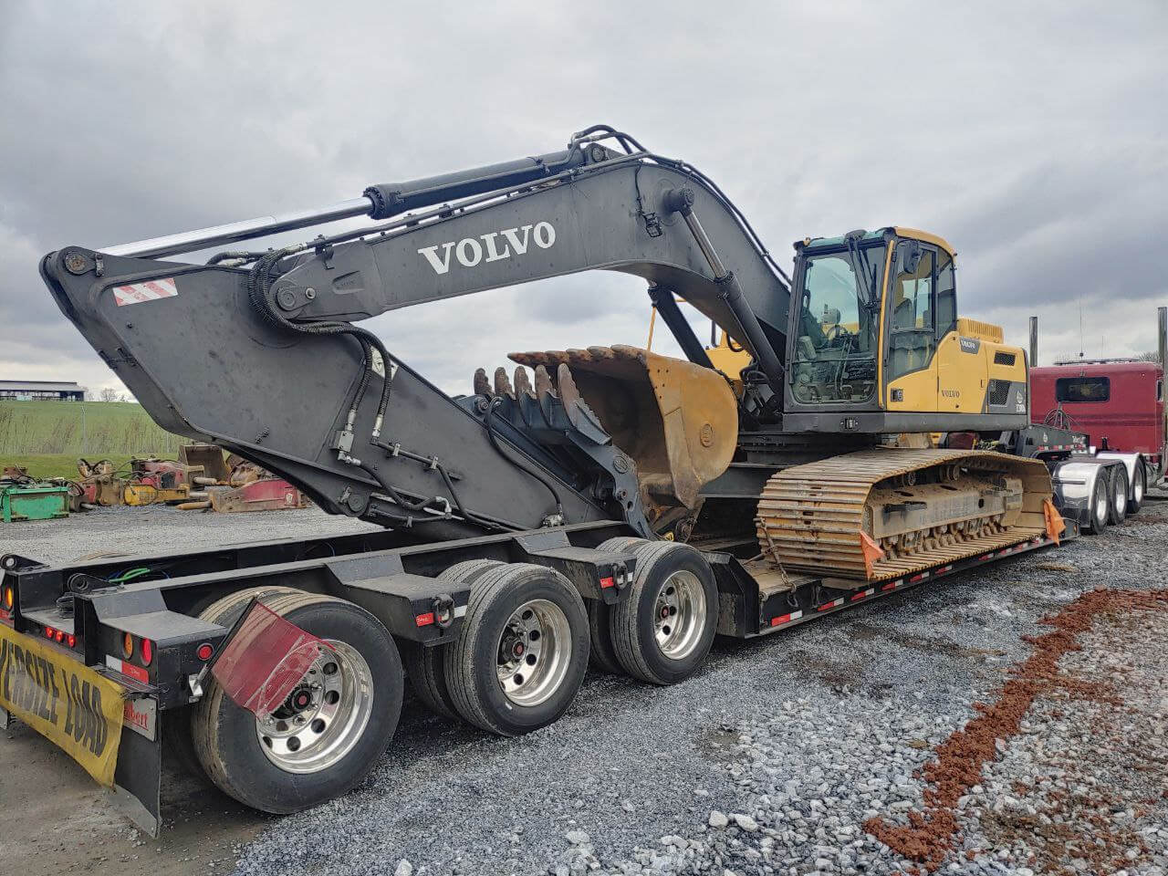 Truck Hauling Volvo Construction Equipment